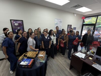 Staff and guests celebrating the Amazing Home Care office opening